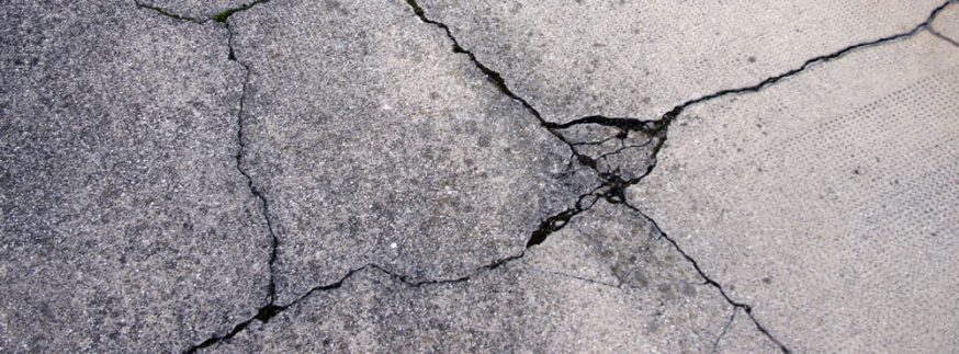 Cracked and Damaged Asphalt in need of repair