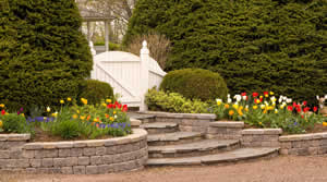 stackable stone retaining wall and stone stairs