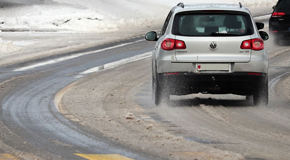 Ice Melt on Road with Car