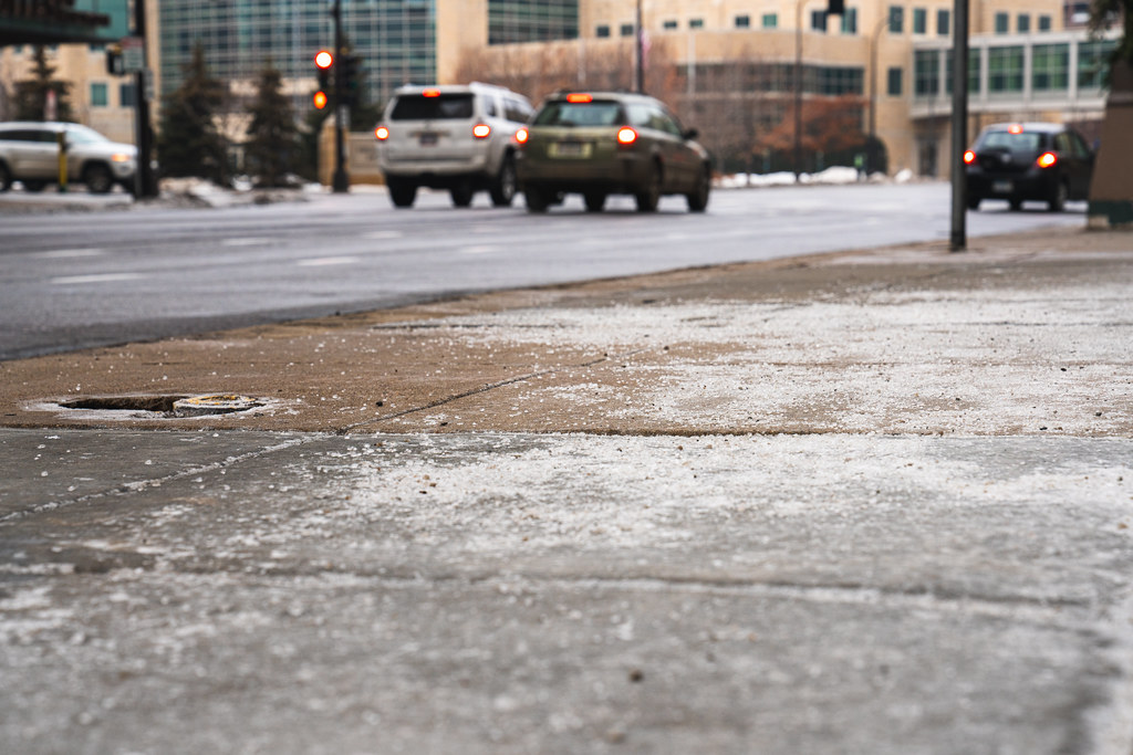 Icy road and sidewalks need snow removal services